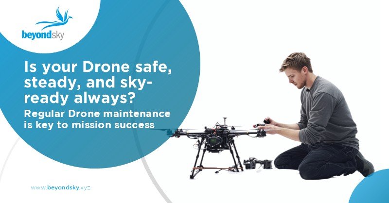 Technician performing drone maintenance and inspection for safe flight